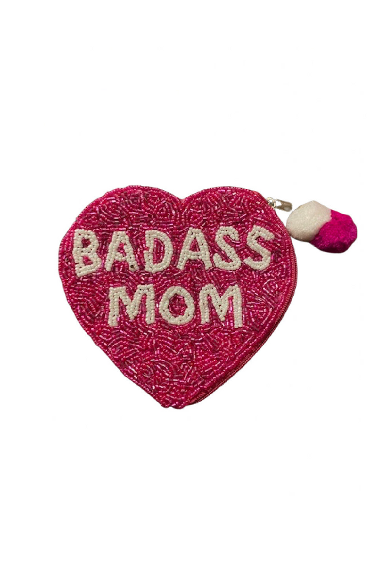 a heart shaped object with a pompom