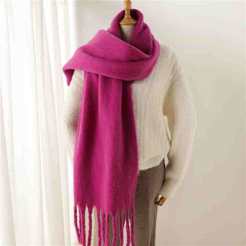 a mannequin wearing a scarf
