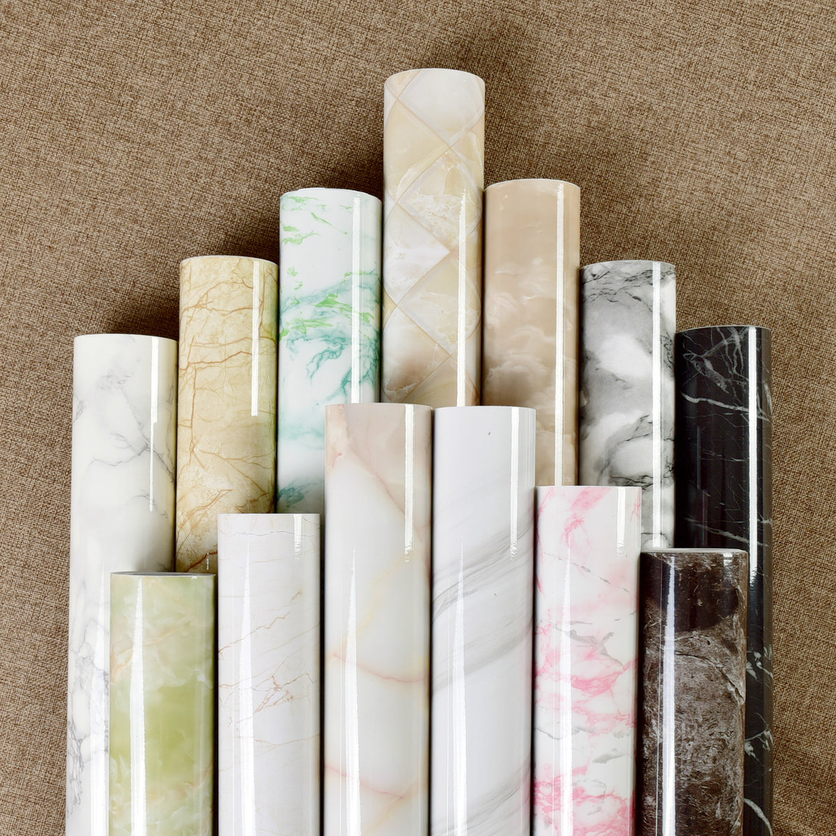 a group of rolls of marbled paper