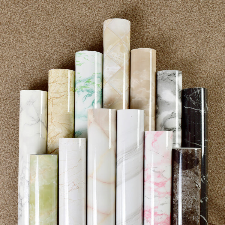 a group of rolls of marbled paper