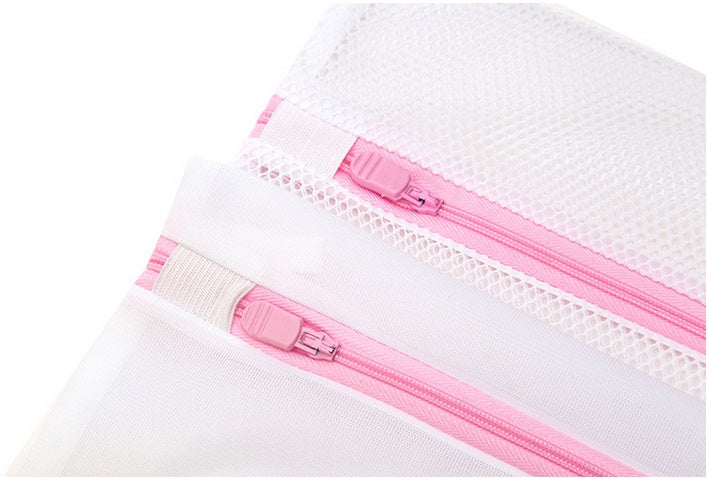 a close up of zippers
