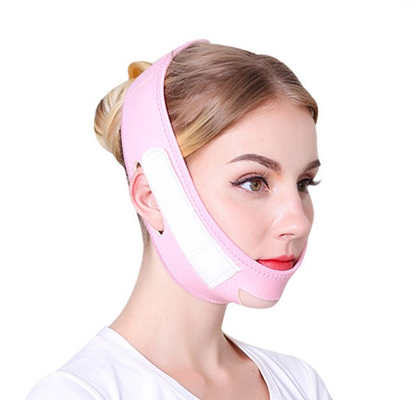a woman wearing a pink head brace