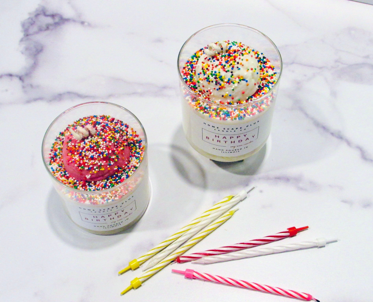 a couple of candles with ice cream in them