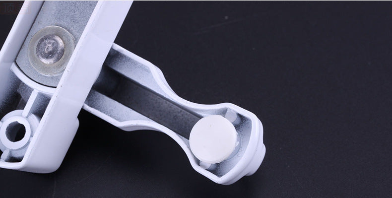 a white object with a round object on it