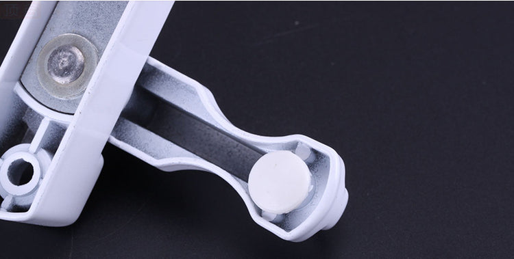 a white object with a round object on it