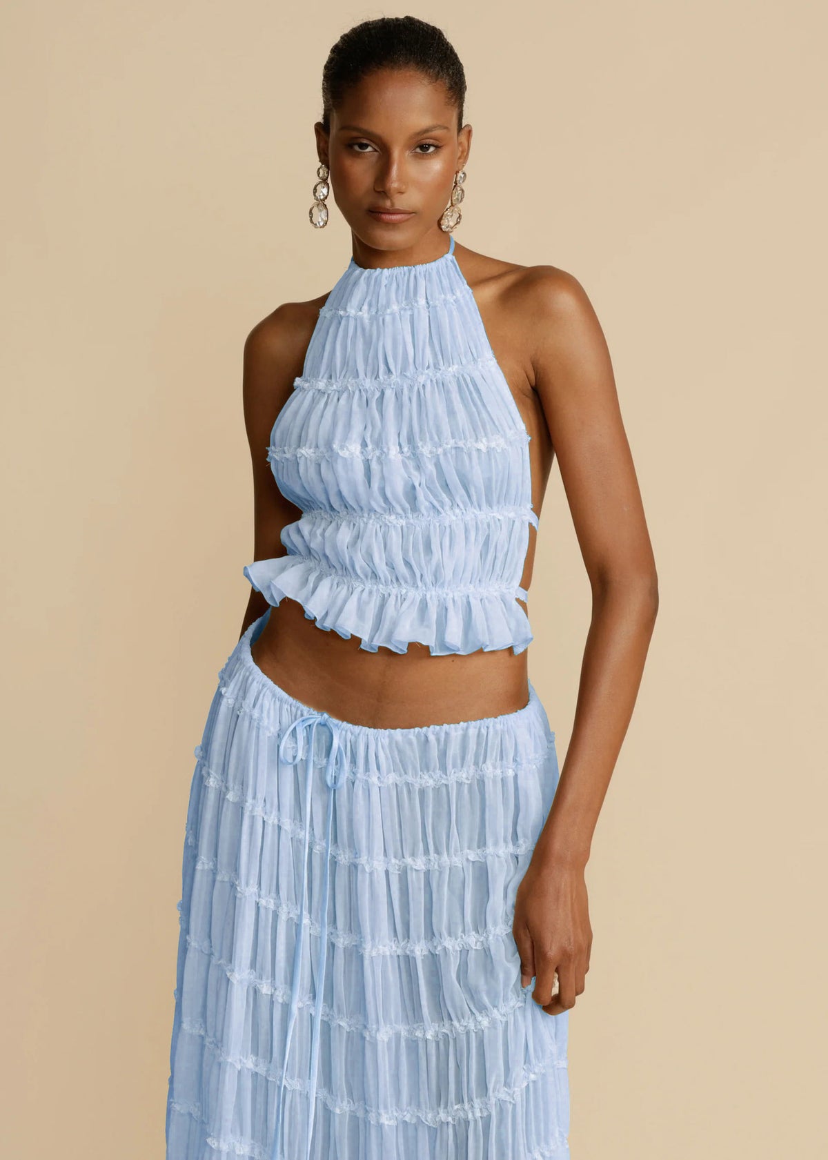 a woman in a blue dress