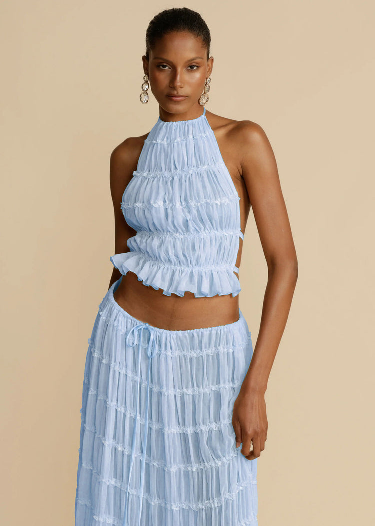 a woman in a blue dress