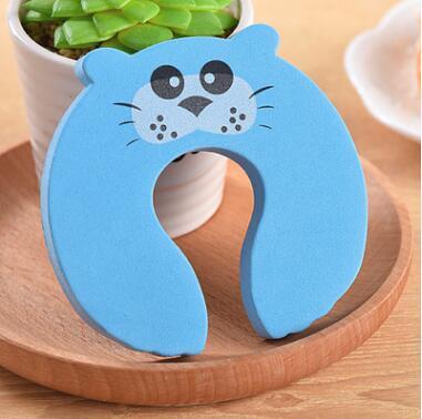 a blue neck pillow on a wooden plate