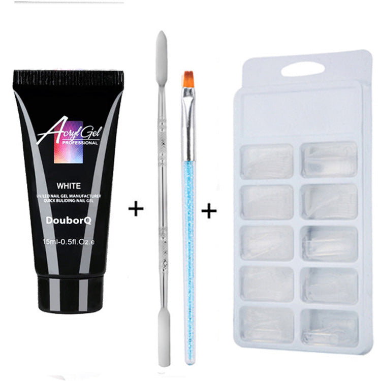 a black tube of gel and a white brush
