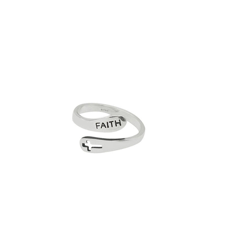 a silver ring with a cross on it