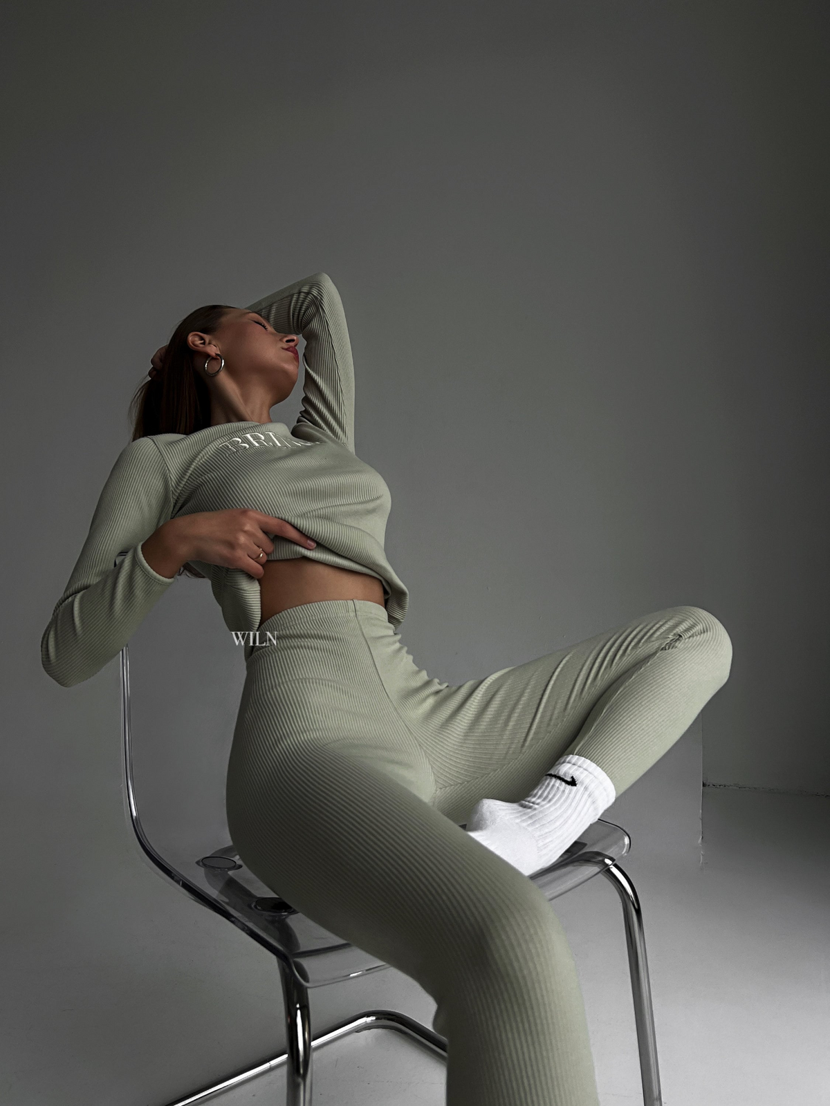 a woman sitting in a chair