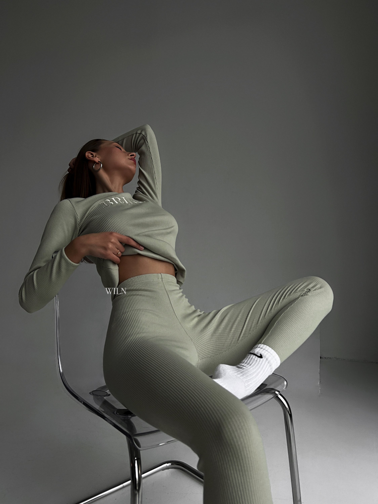a woman sitting in a chair