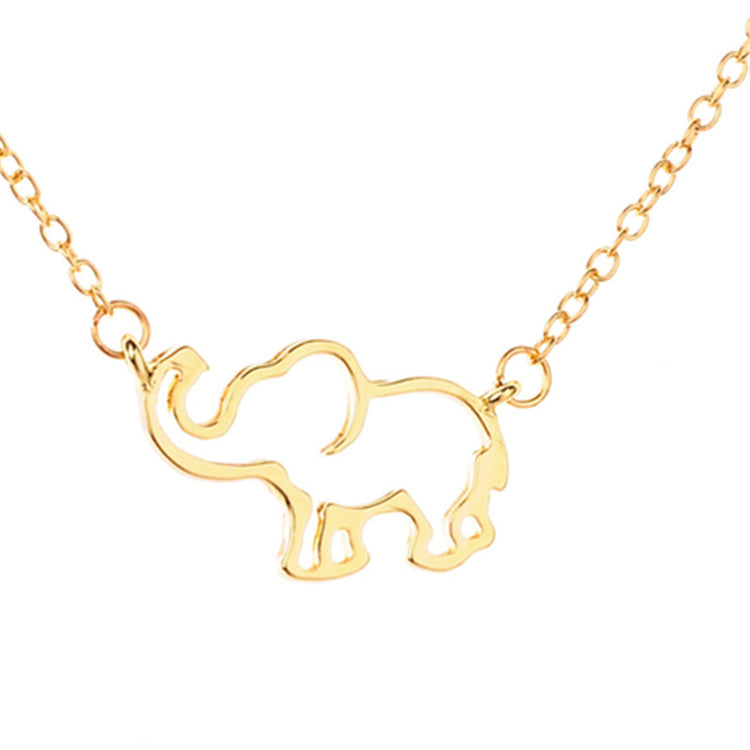 a gold elephant necklace with a white background