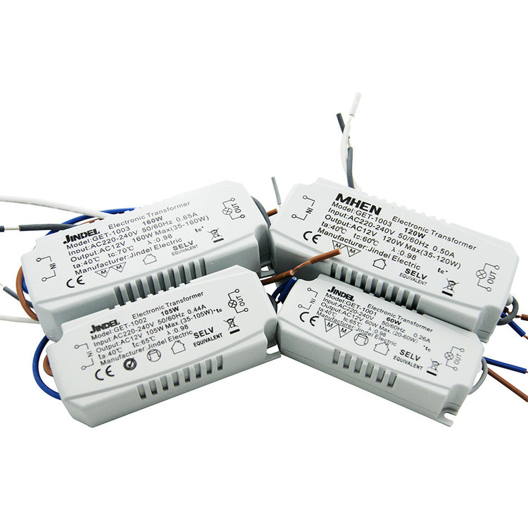 several white electrical devices with wires