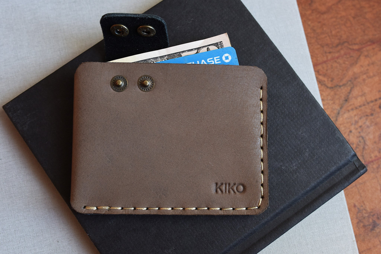 a wallet with money and credit card inside