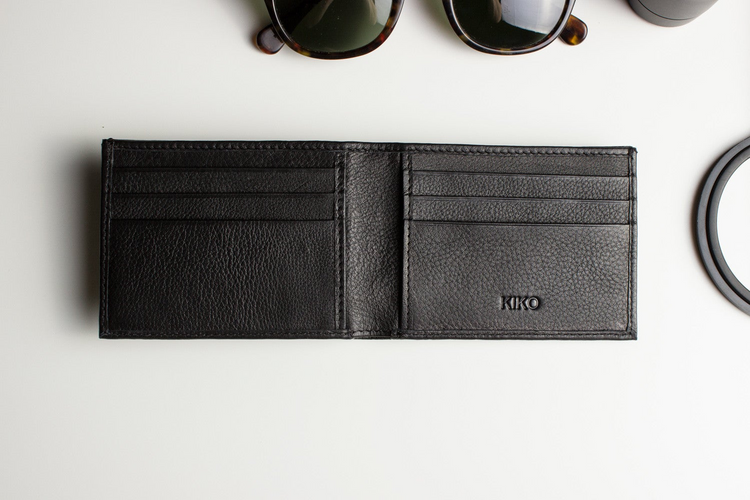 a wallet with a pair of sunglasses