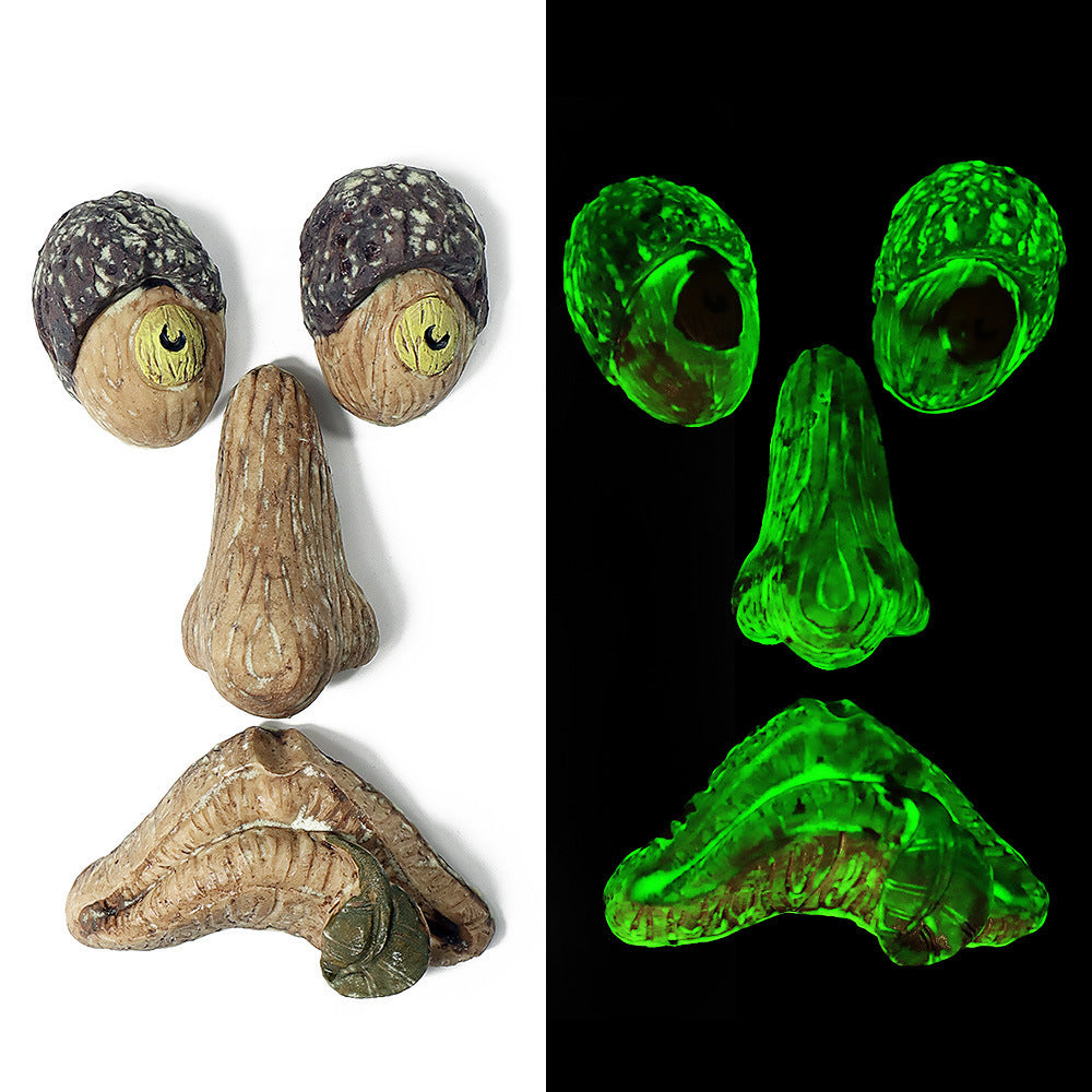 a face made of stones and a green light