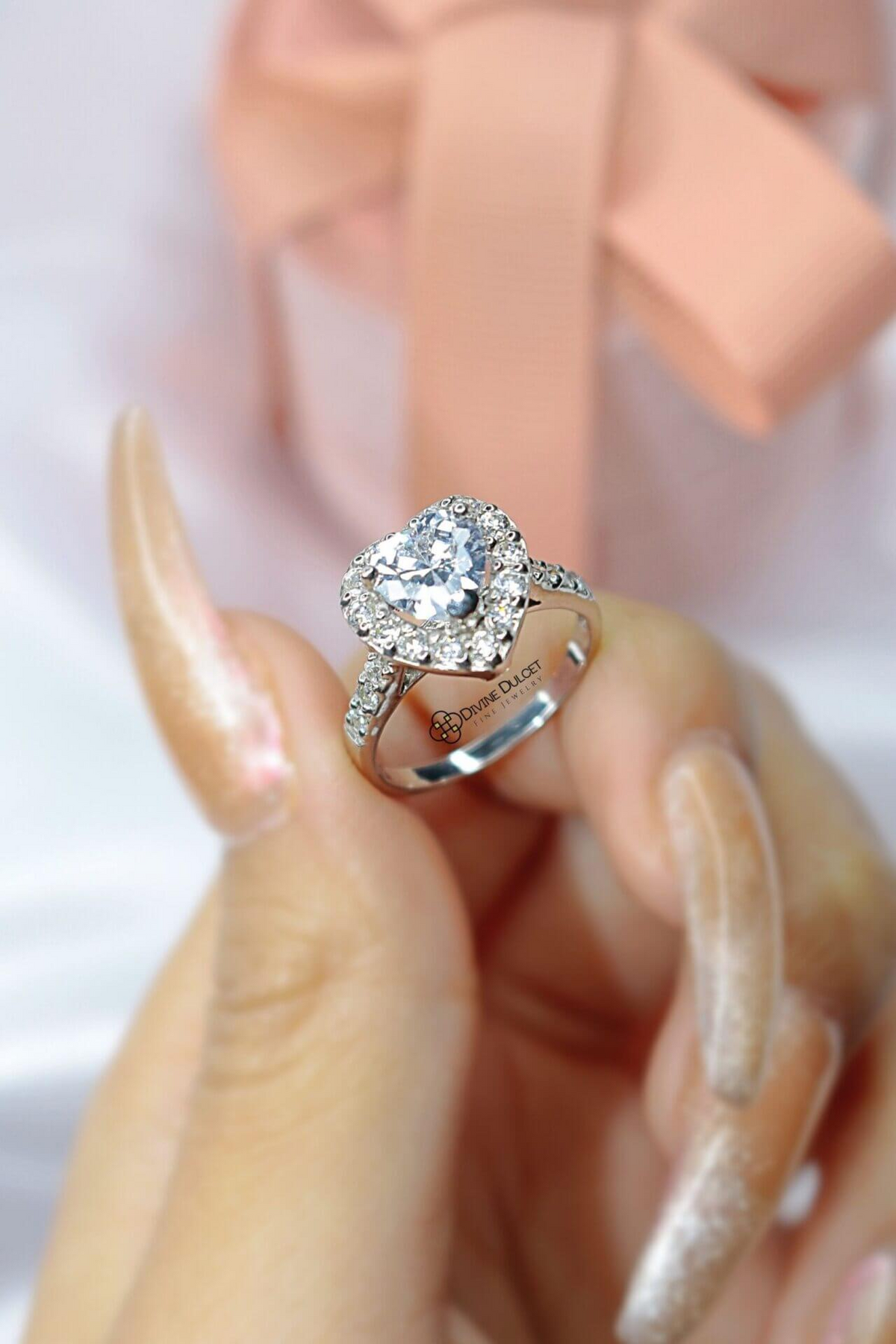 a person holding a diamond ring
