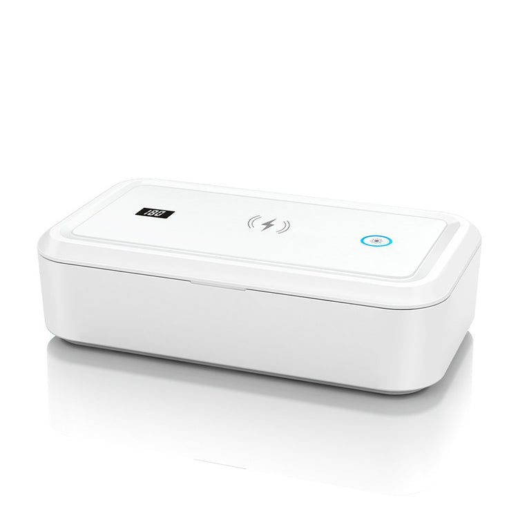 a white rectangular object with a button on it