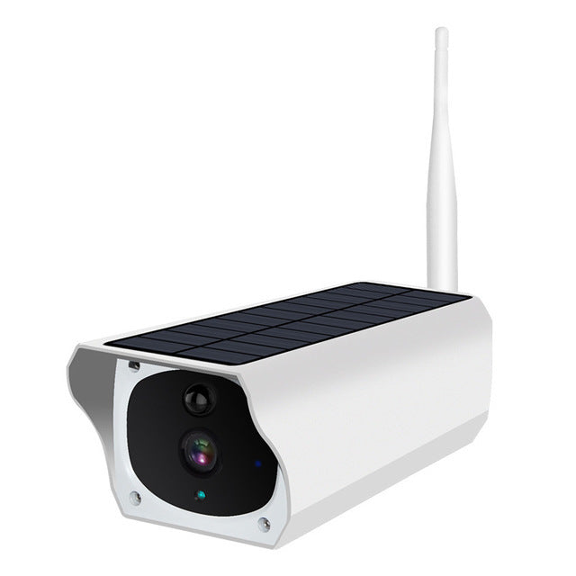 a white camera with a solar panel