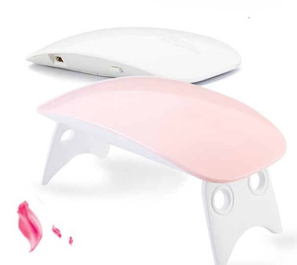 a close up of a nail lamp
