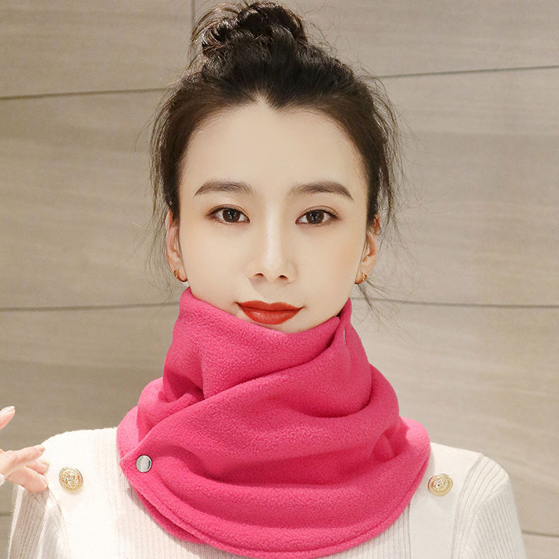 a woman with a scarf around her neck