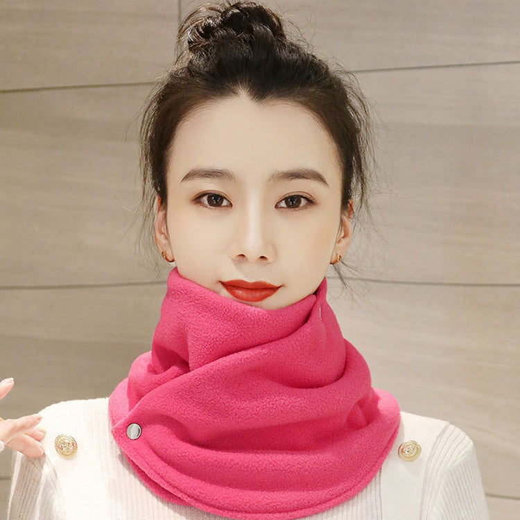 a woman with a scarf around her neck