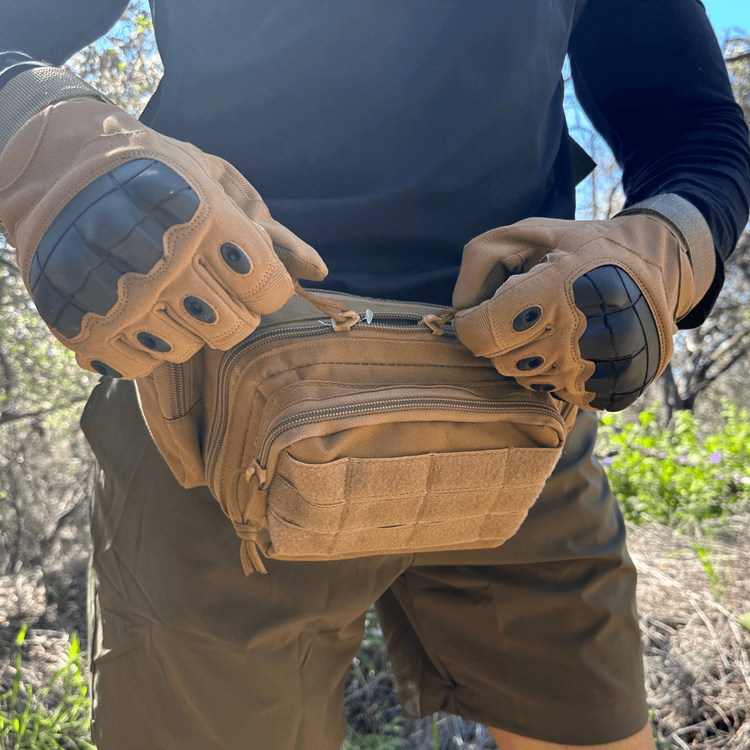 a person wearing gloves and gloves holding a bag