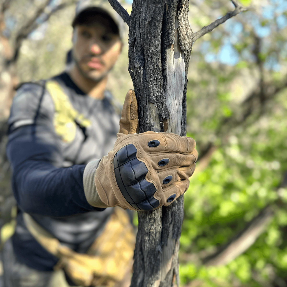 a man holding a tree