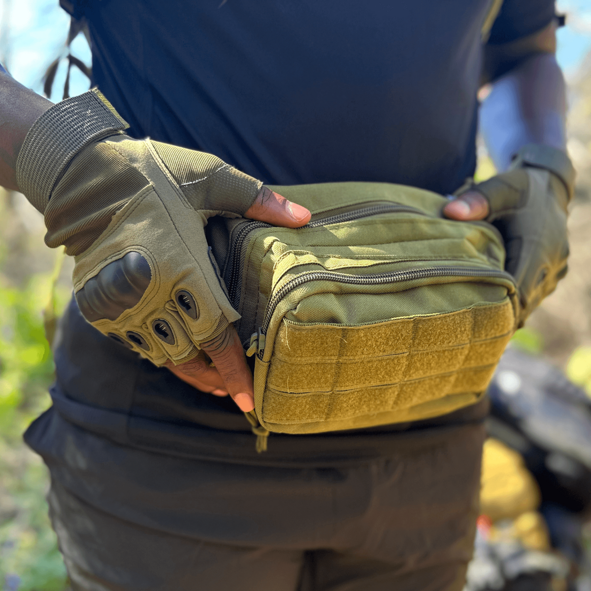 a person holding a military bag