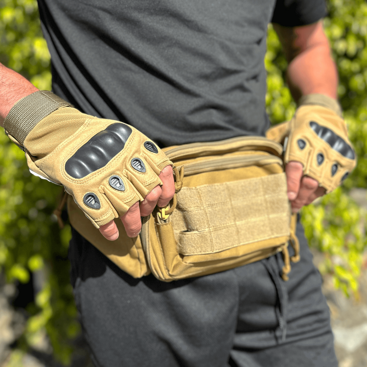 a man wearing gloves and a waist bag