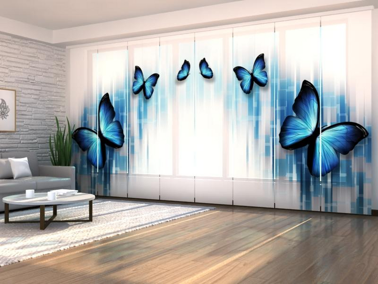 a room with a blue butterfly wallpaper