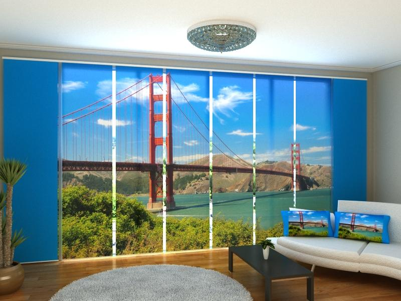 a room with a large window with a large bridge and a couch