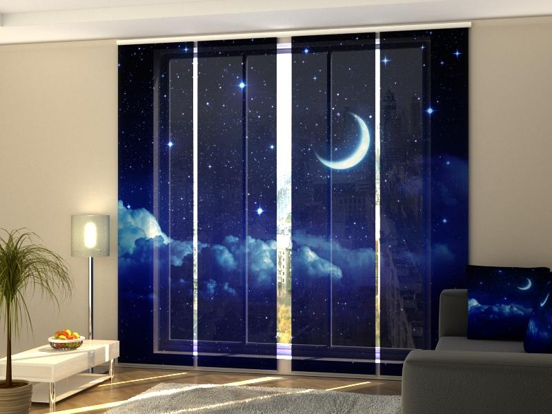 a room with a window with a moon and stars