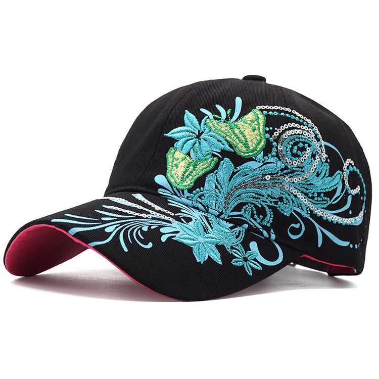 a black hat with blue and green design
