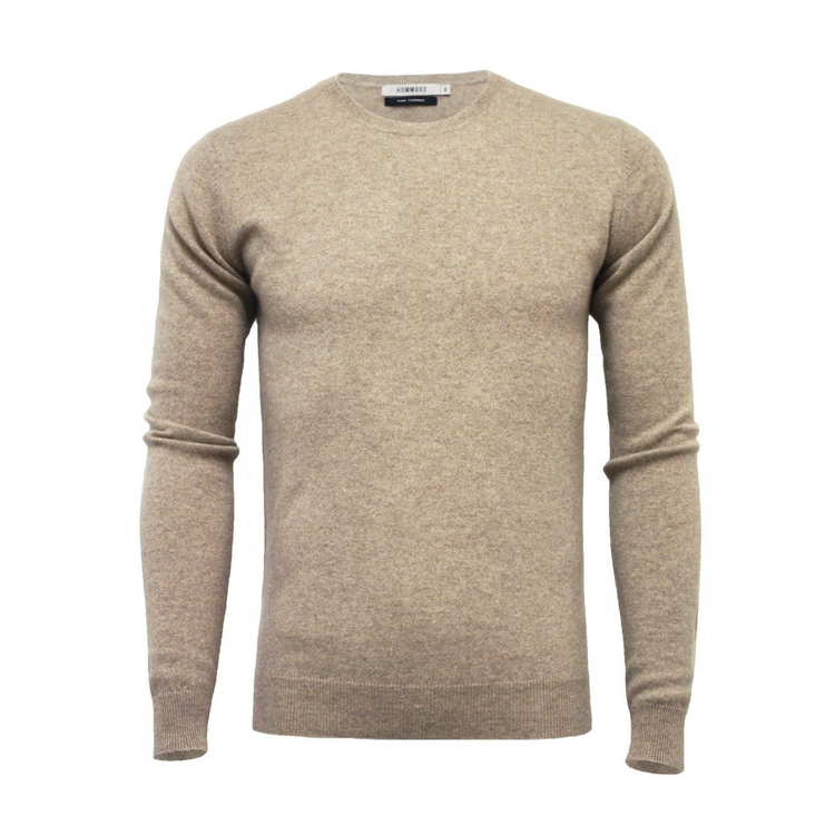 a tan sweater with long sleeves