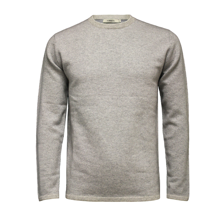 a white sweater with long sleeves