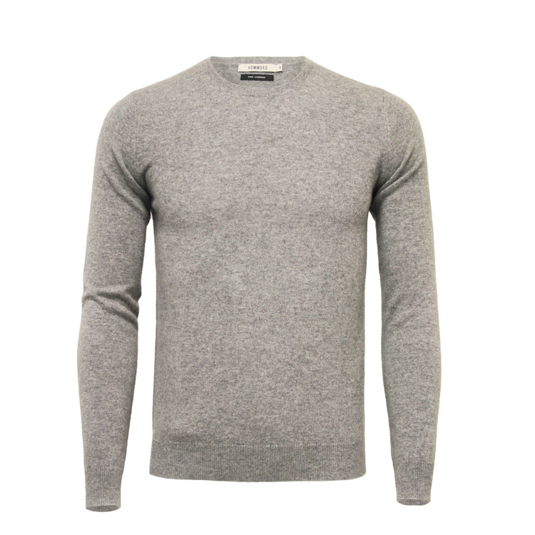 a grey sweater with long sleeves