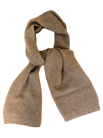 a brown scarf on a black background