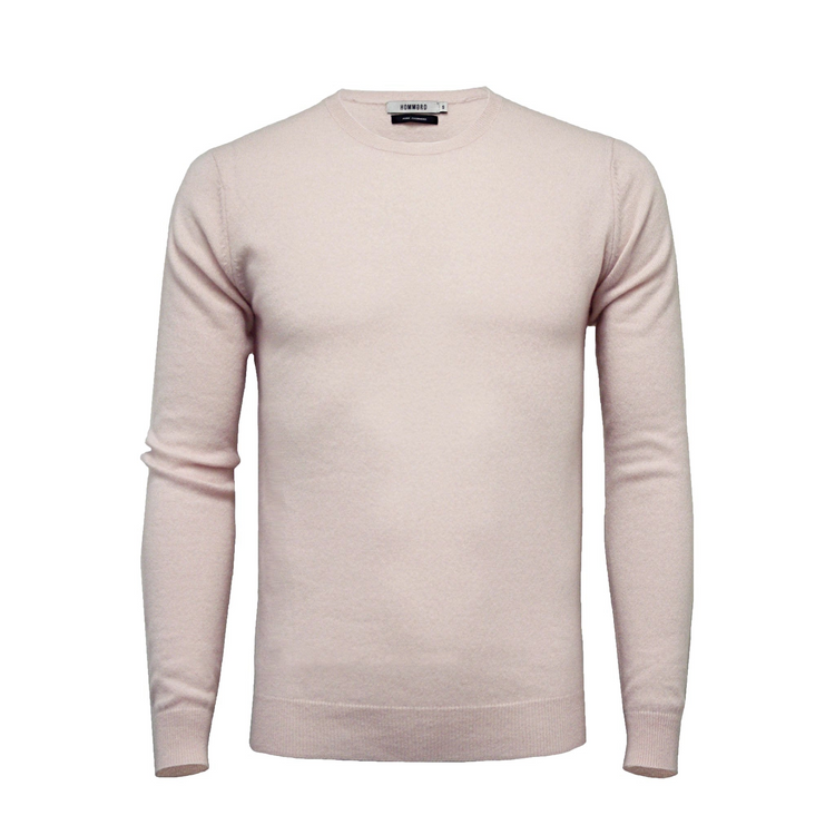 a pink sweater with long sleeves