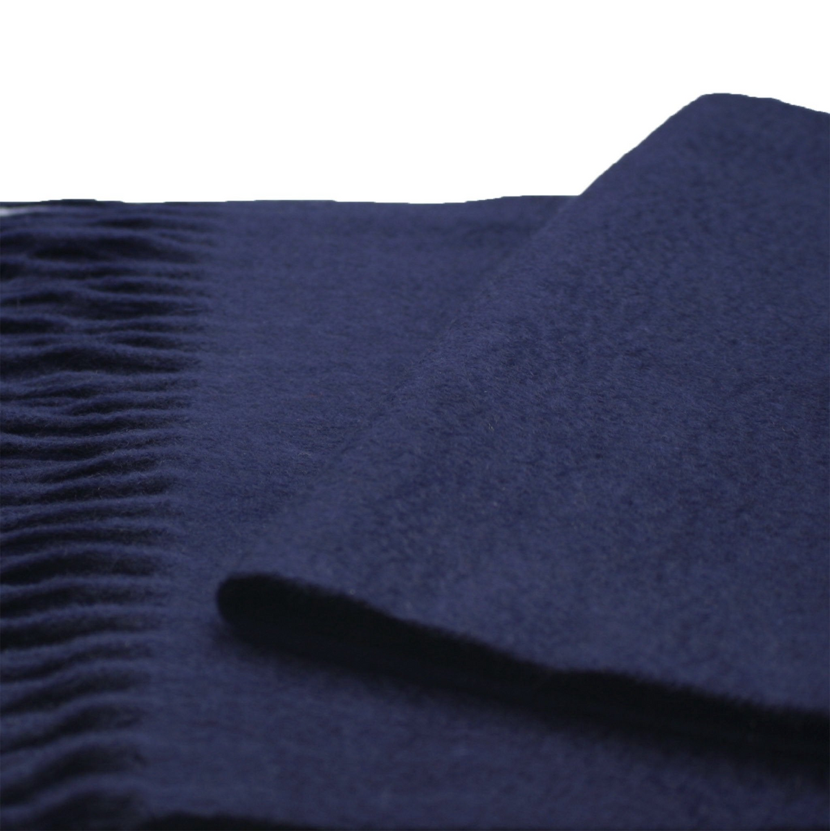 a blue blanket with fringe