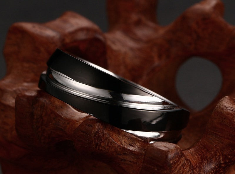 a black and silver ring