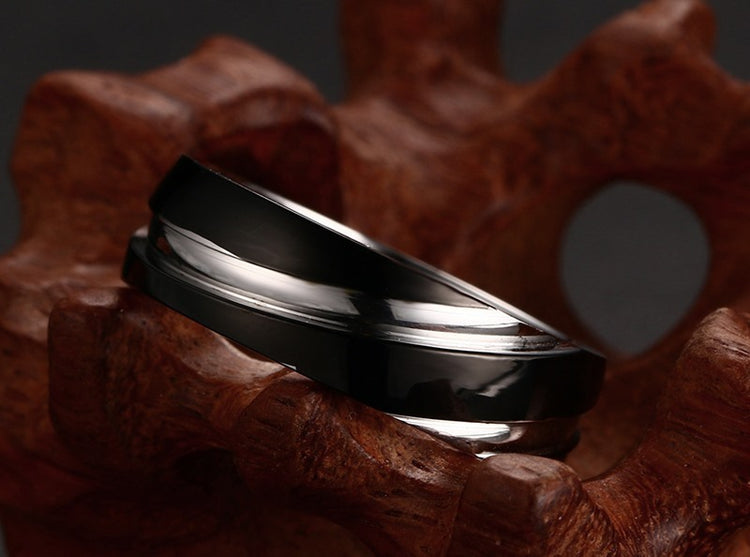 a black and silver ring