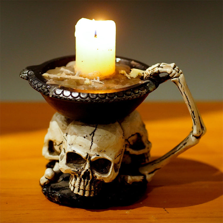a skull with a candle in it