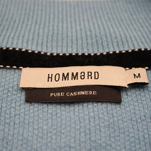 a label on a blue fabric