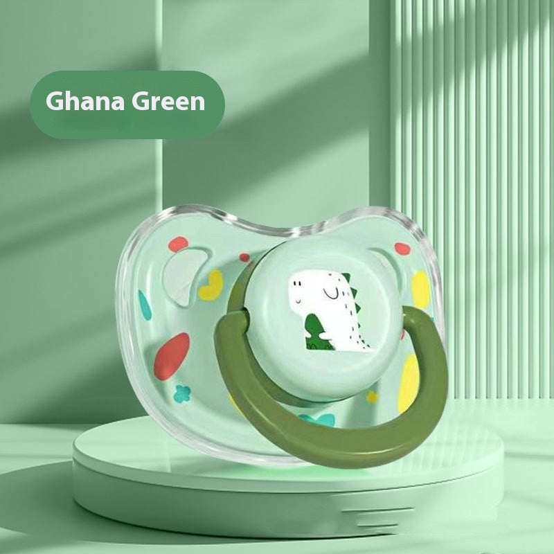 a green pacifier on a platform
