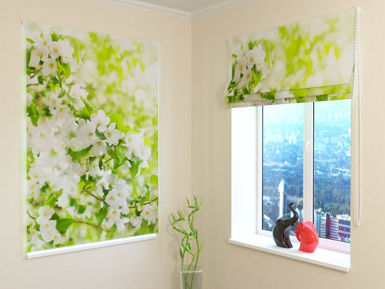 a window with a picture of a tree and a vase with a statue