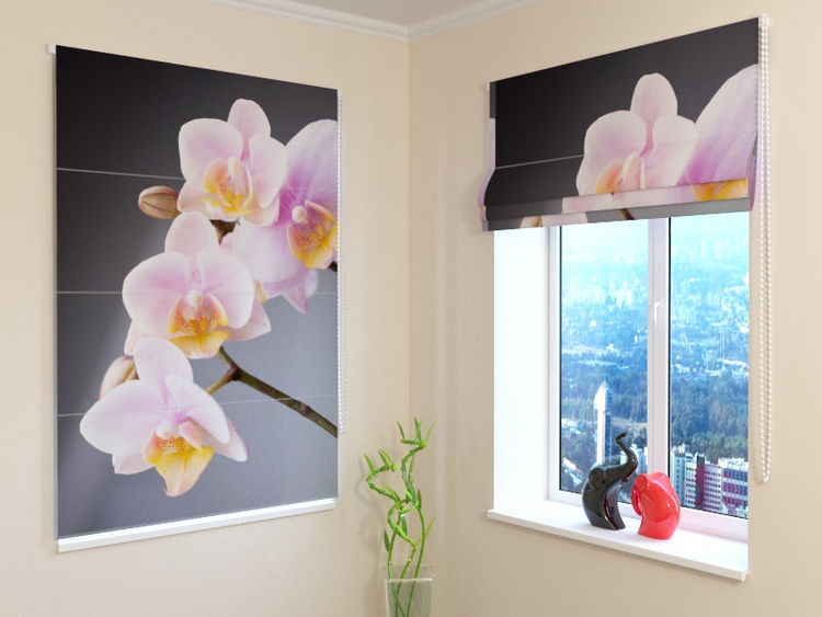 a window with a vase and a picture of flowers