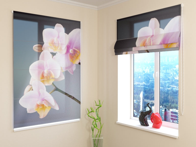 a window with a picture of flowers and a vase on the ledge