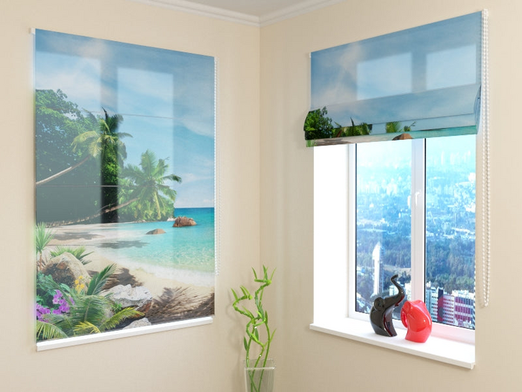 a window with a picture of a beach and a tree